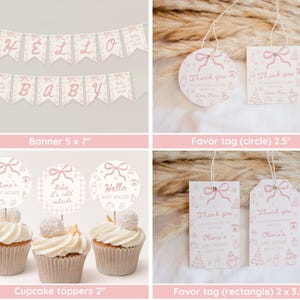 May include: A collection of baby shower decorations in soft pink. Includes a banner with "HELLO BABY" text, cupcake toppers, and favor tags. The banner is 5 x 7 inches, cupcake toppers are 2 inches, and favor tags are 2 x 3.5 inches.