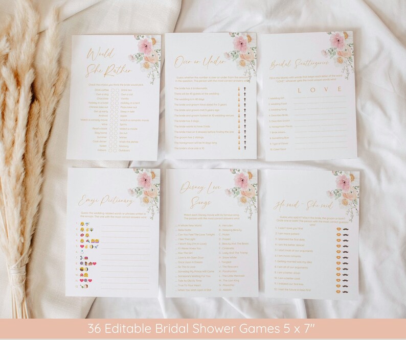 Op de afbeelding: Set van zes printbare bruidsdouchespele met een bloemenmotief. De spellen omvatten "Would She Rather", "Over or Under", "Bridal Scattergories", "Emoji Dictionary", "Disney Love Songs" en "He Said - She Said".