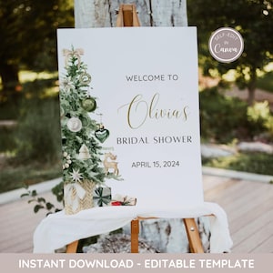 May include: A printable sign for a bridal shower with a watercolor illustration of a Christmas tree decorated with ornaments and presents. The sign says "Welcome to Olivia's Bridal Shower April 15, 2024".