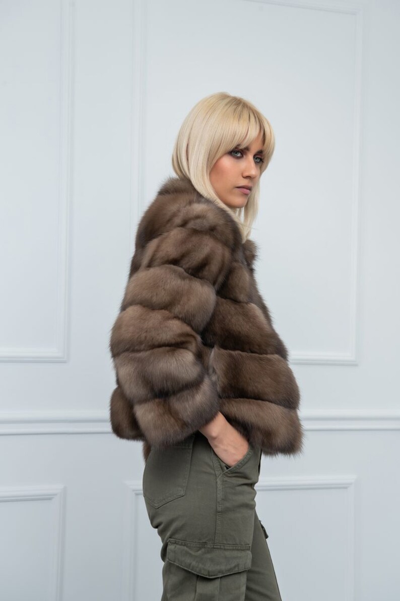 Lavander Sable Fur Cropped Jacket Side. A genuine sable fur jacket with side pockets. It has a regular fit and is produced by Shopifur