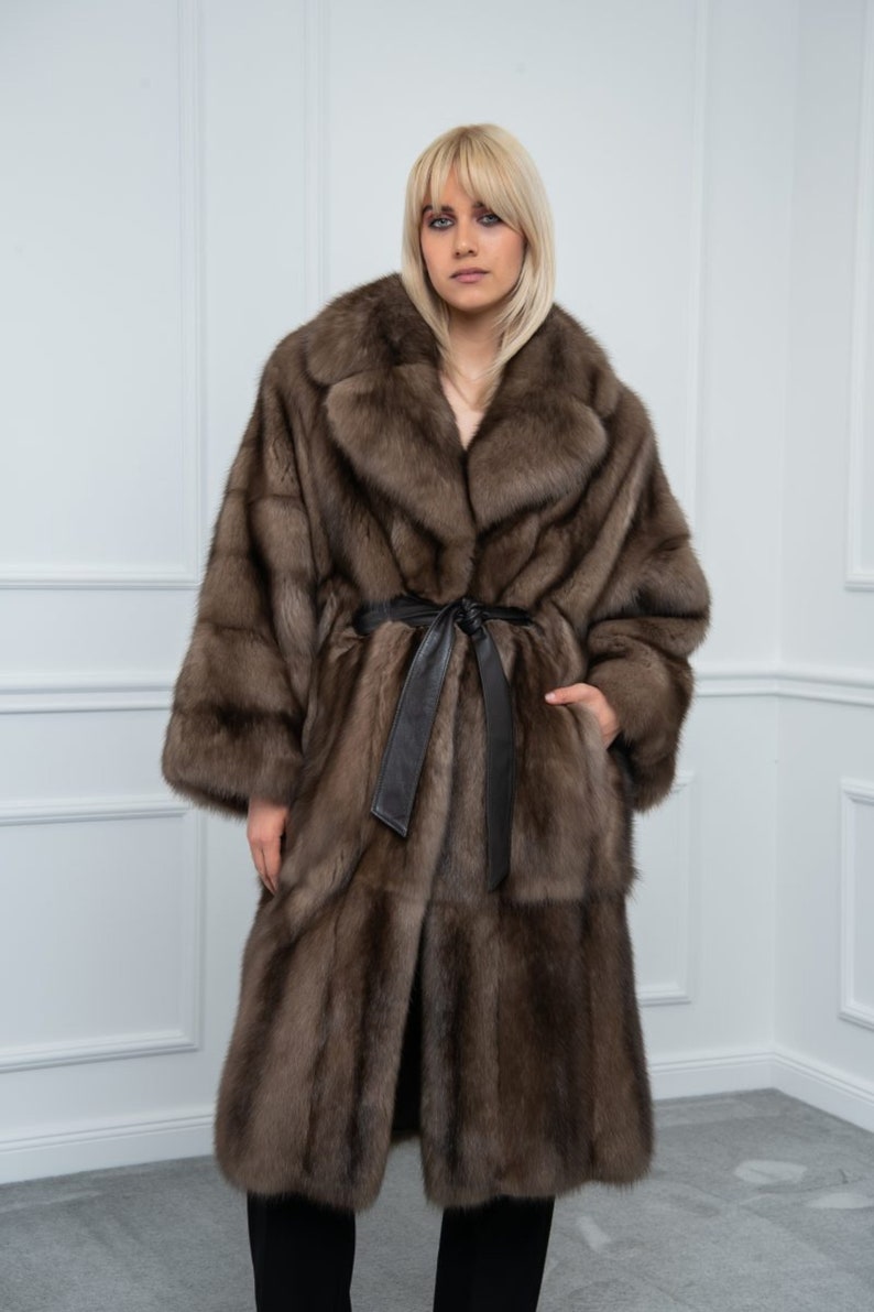 Platinum Sable Relaxed Fit Fur Coat Front. Discover our sable collection, exceptional choices only for sable fur lovers, always tailor made for your needs. On the lining every label that indicates the quality and the origin of the skins.