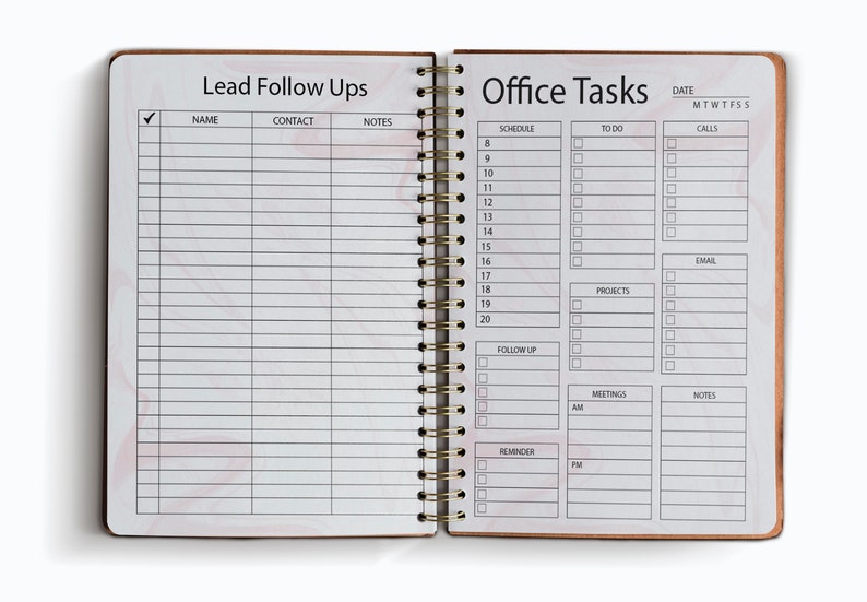 May include: A white planner with a marble pattern. The left page is labelled "Lead Follow Ups" with columns for name, contact, and notes. The right page is labelled "Office Tasks" with sections for schedule, to do, calls, projects, email, meetings, and notes.