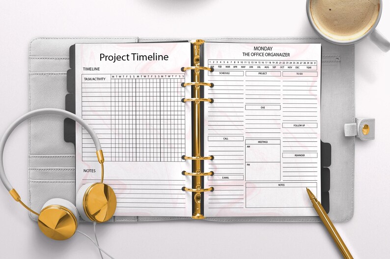 May include: A white planner with a gold ring binder. The left page has the title "Project Timeline" and a grid for scheduling tasks. The right page has the title "Monday The Office Organizer" and a grid for scheduling appointments, calls, meetings, and emails.