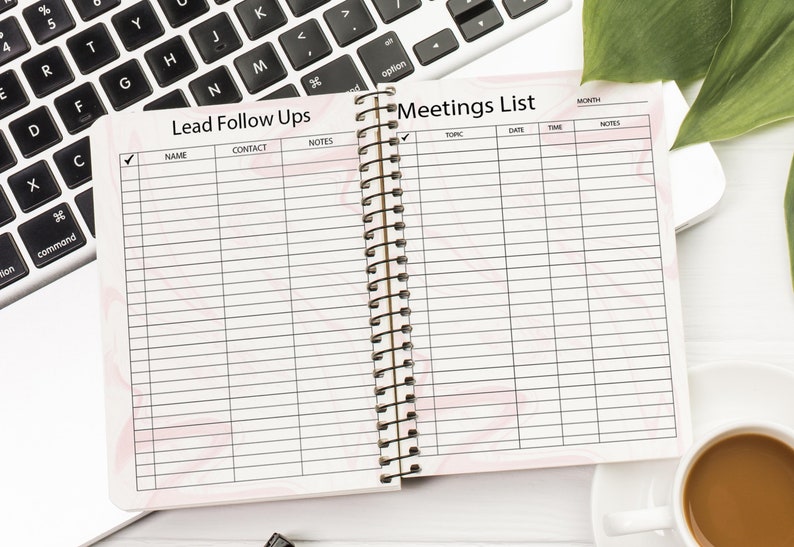 May include: An open spiral bound notebook with two pages. The left page has the title "Lead Follow Ups" with columns for name, contact, and notes. The right page has the title "Meetings List" with columns for month, topic, date, time, and notes.