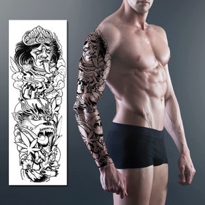 May include: Black and white temporary tattoo sleeve featuring a detailed design of a deity, skulls, and floral elements. The tattoo is displayed on an arm, showcasing the intricate artwork and bold contrast.