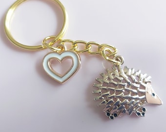 Hedgehog Keyring: White Heart Charm, Novelty Keychain Gift. Gold tone.