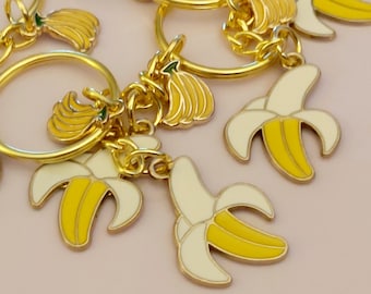 Banana keyring. Gold tone keychain with peeled banana and small bunch of banana charms. Banana fan gift. World's favourite fruit on keyring