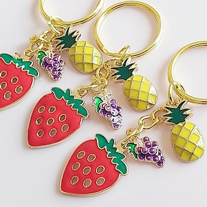 Strawberry pineapple grape keyring. Fruit bunch keychain on gold tone split keyring.