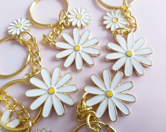 Double daisy keyring. White and yellow daisy enamel charms on gold tone split keyring. Danish marguerite daisy. Denmark's national flower.