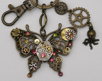 Porte-clés steampunk, porte-clés steampunk, mouvement d'horlogerie, mouvement vintage, mouvement de montre, papillon, swarovski arc-en-ciel, mouvement soviétique des années 30