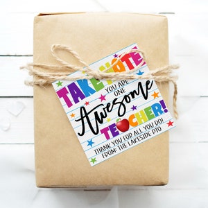 May include: A colorful gift tag with the text "Take Note You Are One Awesome Teacher!" with a red apple graphic and stars. The text "Thank You For All You Do! From: The Lakeside PTO" is also included.