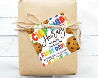 May include: A colorful gift tag with a cookie theme. The tag says "Chip Hooray! Wishing you a happy first day! Welcome back to school! From the Lakeside PTO".