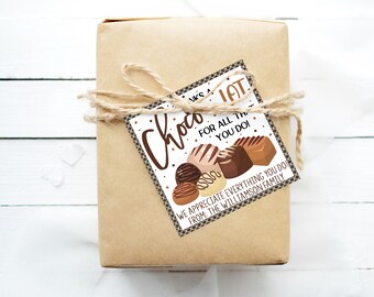 May include: A brown gift box with a white gift tag tied with twine. The gift tag has a chocolate theme and says "Choco" with a chocolate bar design and the text "We appreciate everything you do! From: The Williamson Family".