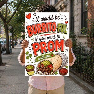 May include: A colorful poster with the text "it would be BURRITO-FUL if you went to PROM with me." The poster features a cartoon burrito with guacamole and salsa. The background shows a person holding the poster on a city sidewalk.