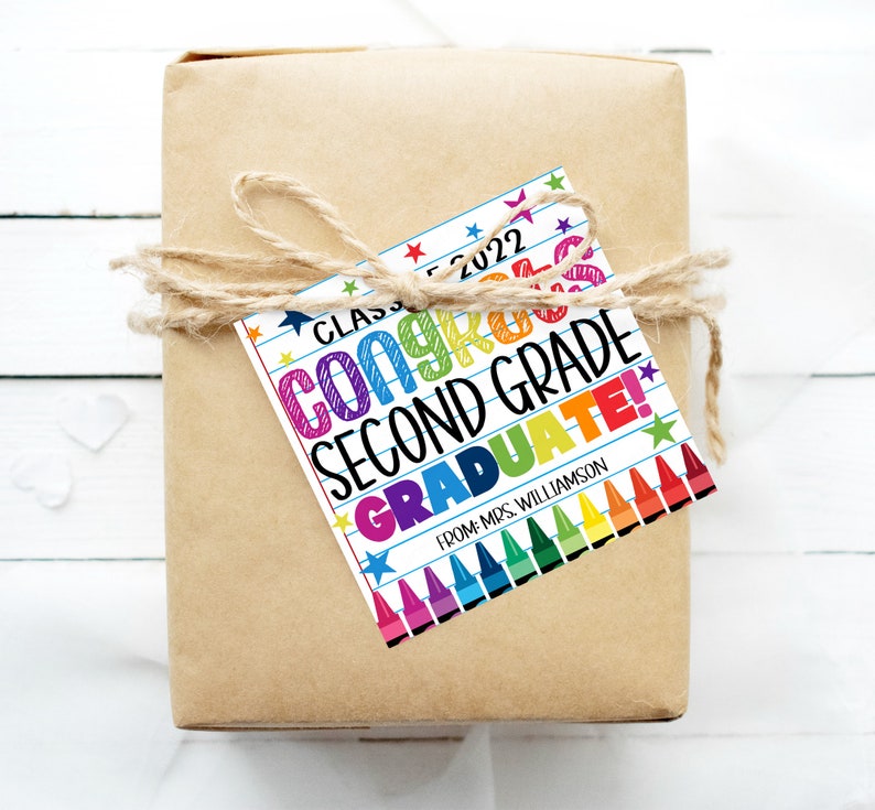 May include: A colorful gift tag with the text "Class of 2022 Congrats Second Grade Graduate!" and a row of crayons at the bottom. The text "From: Mrs. Williamson" is at the bottom of the tag.
