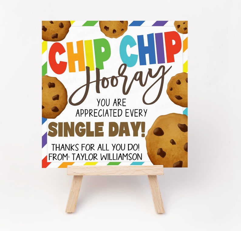 May include: A white card with a rainbow striped border and a message that reads "CHIP CHIP Hooray You are appreciated every single day! Thanks for all you do! From: Taylor Williamson". The card features a cartoon image of chocolate chip cookies.