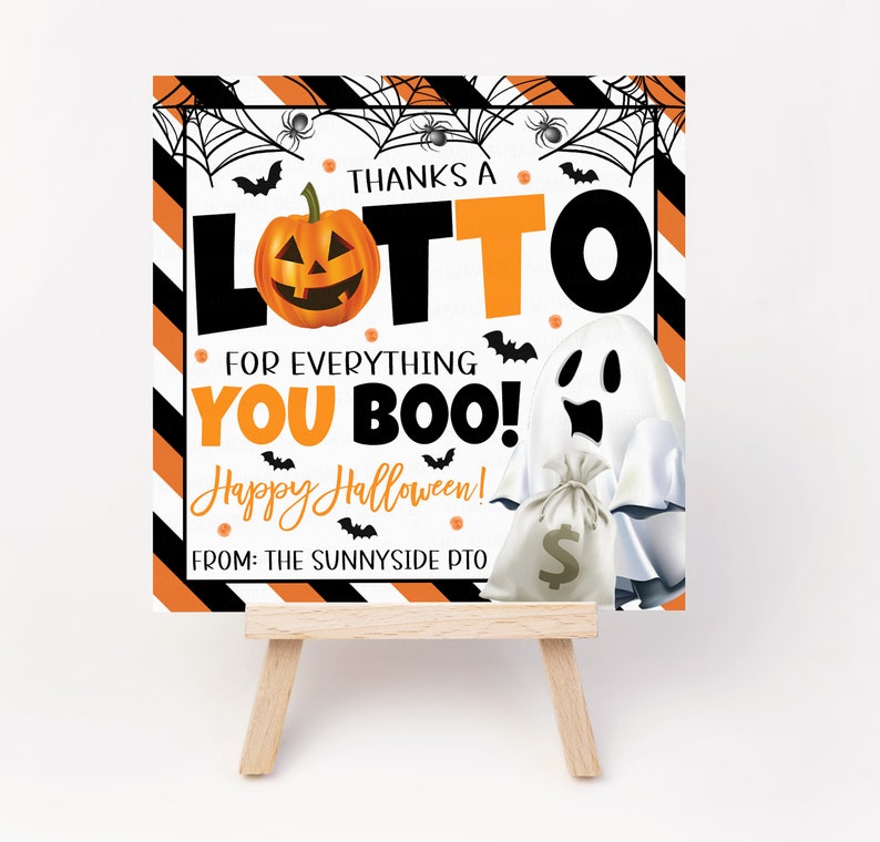 May include: A Halloween-themed sign with orange and black stripes, a jack-o'-lantern, and a ghost holding a money bag. Text reads "THANKS A LOTTO FOR EVERYTHING YOU BOO! Happy Halloween!" and "FROM: THE SUNNYSIDE PTO."