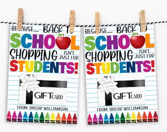 May include: Two colorful gift card holders with the text "Because... Back to School Shopping Isn't Just for Students!" and a gift card inside. The holders are decorated with crayons and a red apple.