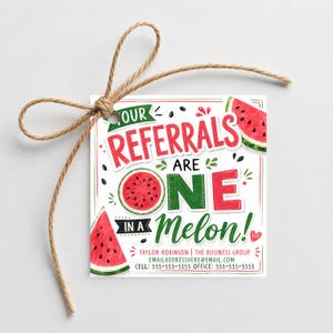 May include: A square paper tag with a brown twine bow featuring a watercolor watermelon theme. The text reads: YOUR REFERRALS ARE ONE IN A MELON! TAYLOR ROBINSON | THE BUSINESS GROUP EMAILADDRESSHERE@EMAIL.COM CELL: 555-555-5555 OFFICE: 555-555-5555.