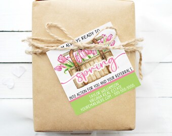 May include: A green and pink gift tag with a basket of pink tulips and the word "Spring" written in cursive. The tag also includes the text "Into action for you and your referrals" and contact information for Taylor Williamson, Virginia Real Estate.