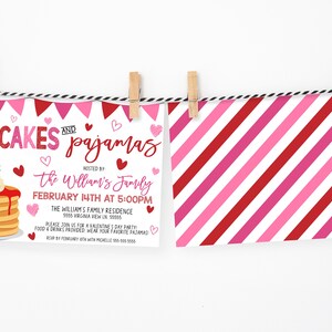 May include: A pink and red striped card with a white background and the text "PANCAKES and pajamas" in red and pink. The text "HOSTED BY" is in red and the text "the Williams' Family" is in black. The text "FEBRUARY 14TH AT 5:00PM" is in black. The text "THE WILLIAMS FAMILY RESIDENCE" is in black. The text "PLEASE JOIN US FOR A VALENTINE'S DAY PARTY" is in black. The text "FOOD & DRINKS PROVIDED. WEAR YOUR FAVORITE PAJAMAS" is in black. The text "RSVP BY FEBRUARY 10TH WITH MICHELLE 555-555-5555" is in black.