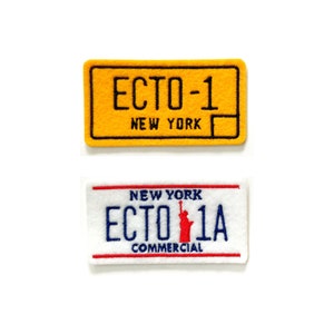 May include: Two embroidered patches, one yellow with black text "ECTO-1 NEW YORK" and one white with blue and red text "NEW YORK ECTO 1A COMMERCIAL"