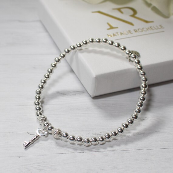 Key bracelet meaning cheap