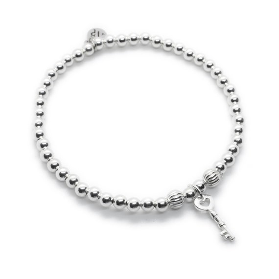 Sterling Silver Key Charm beaded Stacking Bracelet-stretch ladies  bracelet-18th/21st birthday gift for her -minimalist dainty key jewellery - Main Image