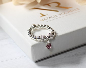 Delicate pink heart stretch sterling silver stretch ring