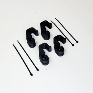 May include: Four black plastic cable clips and three black zip ties.