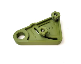 May include: Green plastic woodworking jig with two knobs and the text "YAK HOBBY" printed on the side.