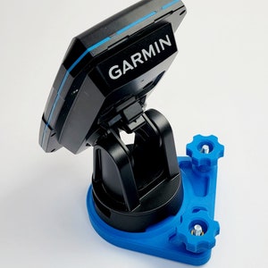 May include: A black Garmin fish finder mounted on a blue 3D printed base with two adjustable knobs.