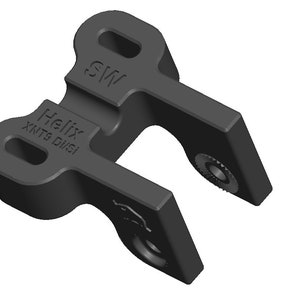 May include: Black plastic bike derailleur hanger with the text "Helix XNT9 D151" and "SW" on it.