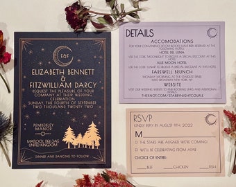 May include: A navy blue wedding invitation with gold foil accents. The invitation features a crescent moon with stars and a forest scene. The text reads "Elizabeth Bennett & Fitzwilliam Darcy request the pleasure of your company at their wedding celebration Sunday, the fourth of September two thousand twenty two Pemberley Manor Matlock DE4 3AG United Kingdom Dinner and dancing to follow".