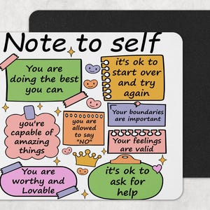 May include: A white mousepad with a black border featuring colorful sticky notes with positive affirmations. Text includes "Note to self," "You are doing the best you can," and "It's ok to ask for help."