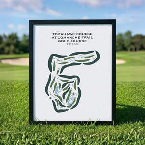 May include: A framed print of the Tomahawk Course at Comanche Trail Golf Course in Texas. The course layout is depicted in green and blue on a white background, with the course name and location printed at the top.