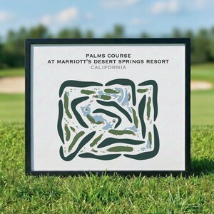 May include: A framed golf course map illustration. The artwork depicts the course layout with green fairways and blue water features. The text at the top reads "Palms Course at Marriott's Desert Springs Resort California."