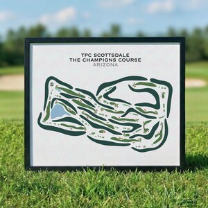 May include: A framed print featuring a stylized map of TPC Scottsdale The Champions Course in Arizona. The graphic displays dark green fairways, light blue water hazards, and sand bunkers on a white background with black text.