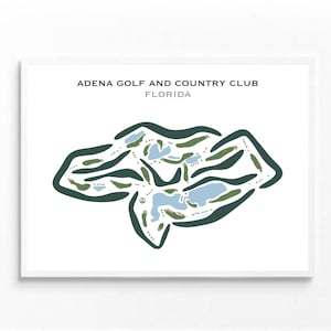 May include: A white framed print of a golf course map with the text "ADENA GOLF AND COUNTRY CLUB FLORIDA". The map is a stylized illustration of a golf course with green fairways and blue water features.