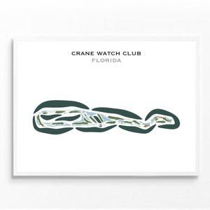 Puede incluir: Impresión enmarcada con un mapa de campo de golf. El mapa está en tonos verdes, azules y marrones, con el texto "CRANE WATCH CLUB FLORIDA" en la parte superior. La impresión está sobre un fondo blanco.