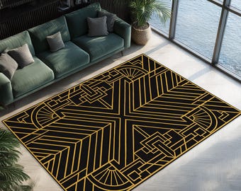 May include: Black and gold geometric patterned area rug. The rug features a symmetrical design with straight lines and fan-like shapes. The rug is rectangular and placed on a light-colored wooden floor. The rug is in a living room setting with a green sofa and large windows.
