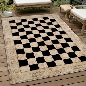 May include: A black and white checkered rug with a beige border. The rug has a vintage, distressed look and is perfect for adding a touch of style to any room.