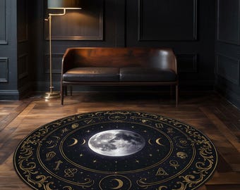 May include: A round black rug featuring a detailed design with a large moon in the center, surrounded by stars, crescent moons, and other celestial symbols. The border has an ornate gold pattern. The rug is placed on a wooden floor.