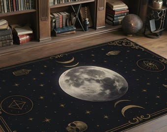 May include: A rectangular black rug with a celestial design. The rug features a large, detailed moon in the center, surrounded by stars, crescent moons, and other mystical symbols in gold. The rug is framed with an ornate gold border.