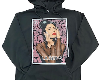 May include: Black hooded sweatshirt with a graphic print of a woman with a crown and the text "La Reina" on a pink background.