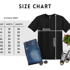 May include: A size chart for Gildan 5000 t-shirts, with measurements in inches. The chart shows sizes S to 5XL, with corresponding width and length measurements. A black t-shirt, blue jeans, sunglasses, and sneakers are also in the image.