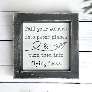 Fold your worries into paper planes and turn them into flying fs - wood framed sign - funny office decor - adult humor - funny signs - gifts