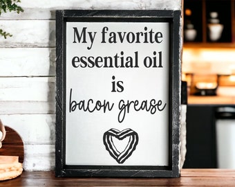 Favorite essential oil is bacon grease - wood sign - farmhouse kitchen decor - funny kitchen signs - popular kitchen decor - kitchen table