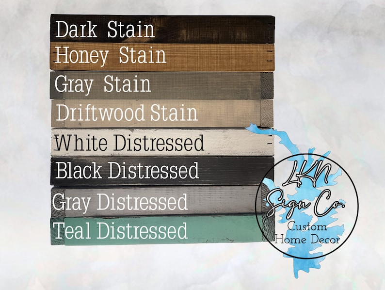May include: A wood sign with eight different stain and distressed paint colors. The colors are: Dark Stain, Honey Stain, Gray Stain, Driftwood Stain, White Distressed, Black Distressed, Gray Distressed, and Teal Distressed. The sign is labeled with the text "4KN Sign Co. Custom Home Decor".
