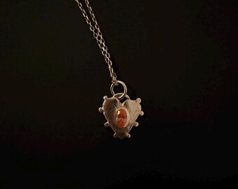 Handmade heart necklace made of fine silver with pink cubic zirconia